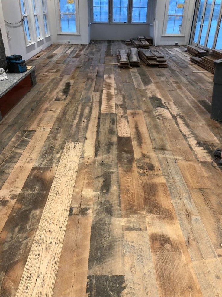Reclaimed barnwood plank floor