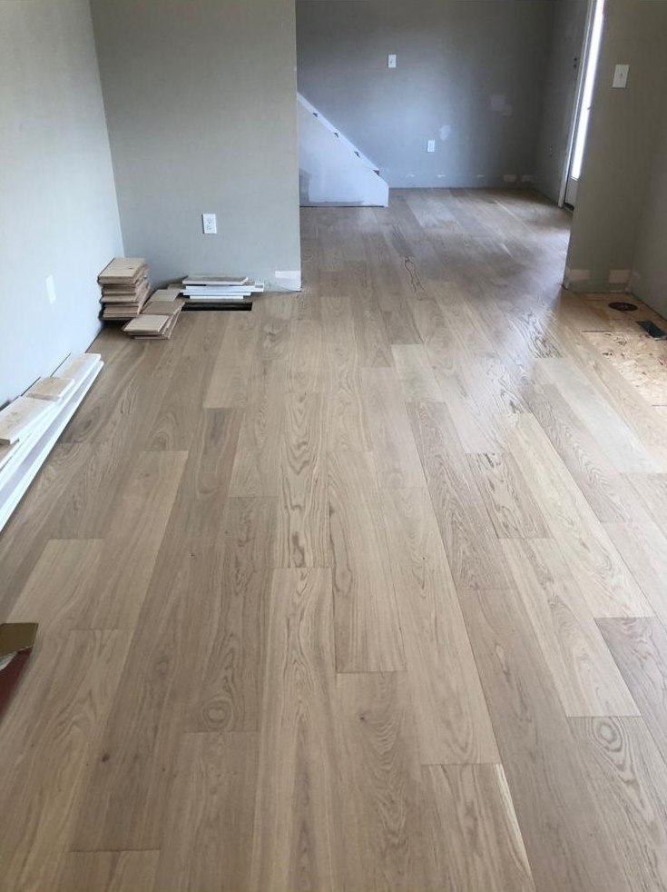 Natural white oak planks through the main floor
